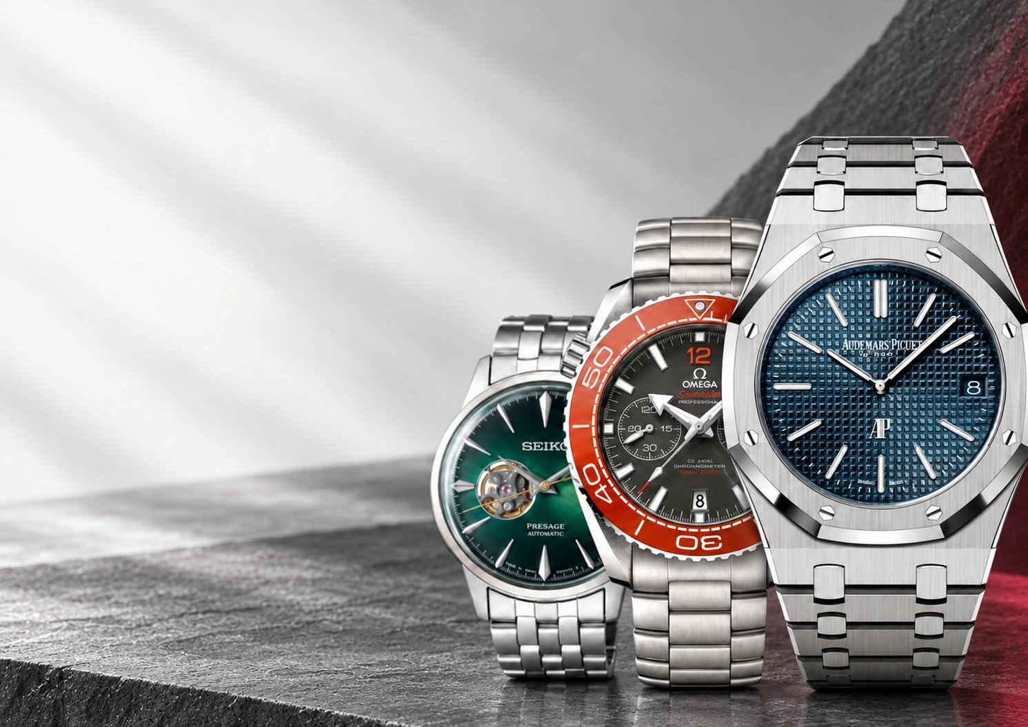 Steel bracelet watches on a stone backdrop — Xero Hour chain watches